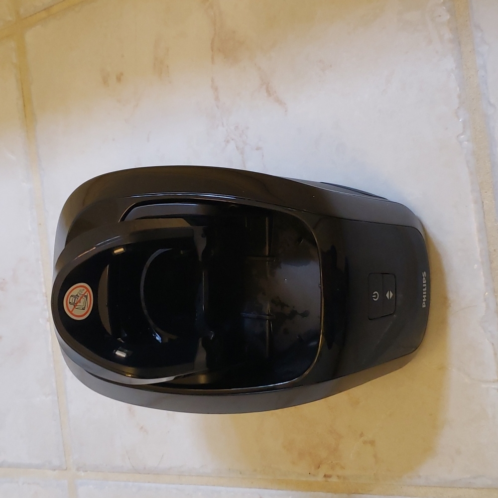 Philips electric razor cleaning machine